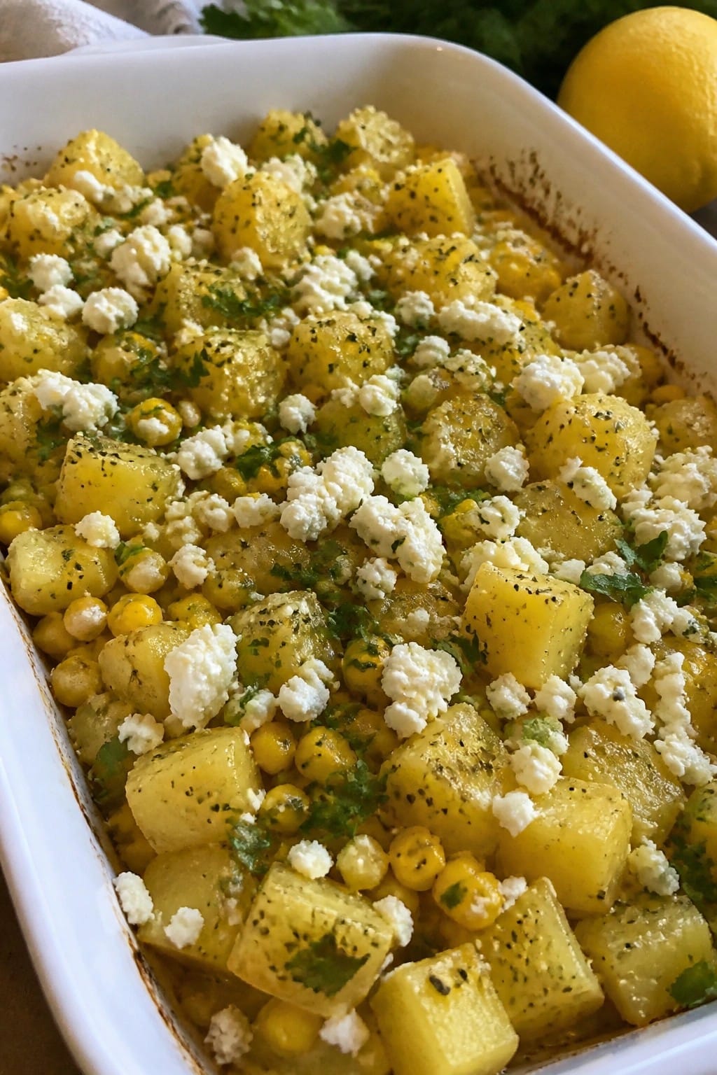 Greek Lemon Herb Potato and Corn Bake