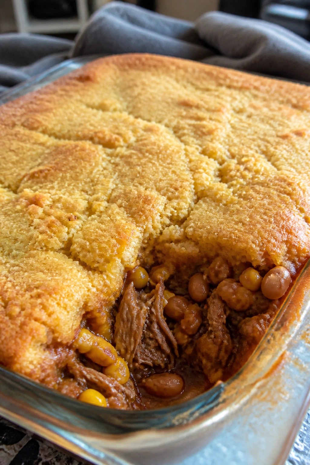 Pork Carnitas and Pinto Bean Casserole with Cornbread Topping