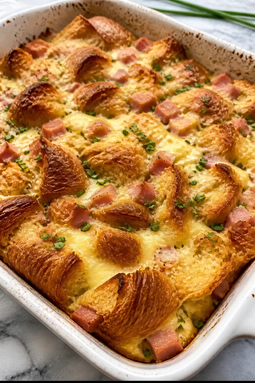 Festive Ham and Cheese Croissant Strata