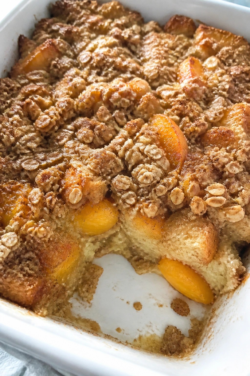 Peach Cobbler French Toast Casserole with Oat Crumble