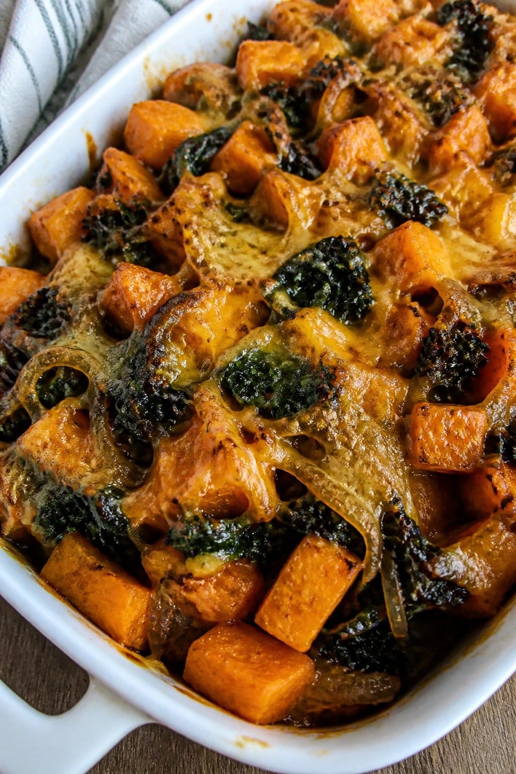 Cheesy Sweet Potato and Kale Casserole with Caramelized Onions