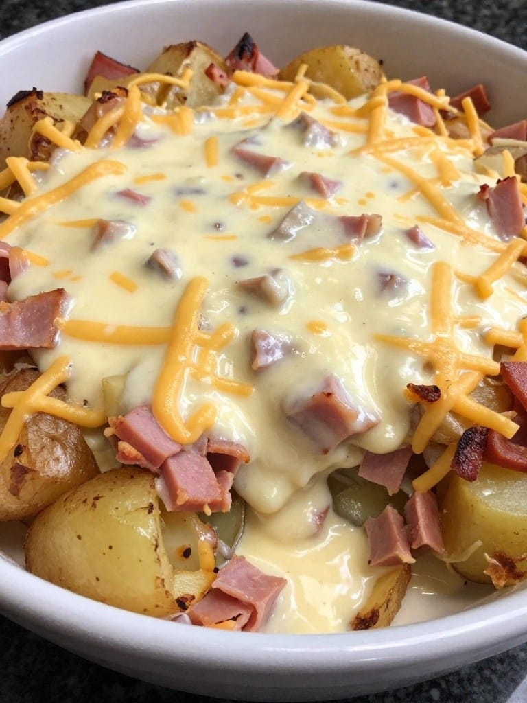 Ham and Swiss Potato Casserole with Dijon Cream Sauce