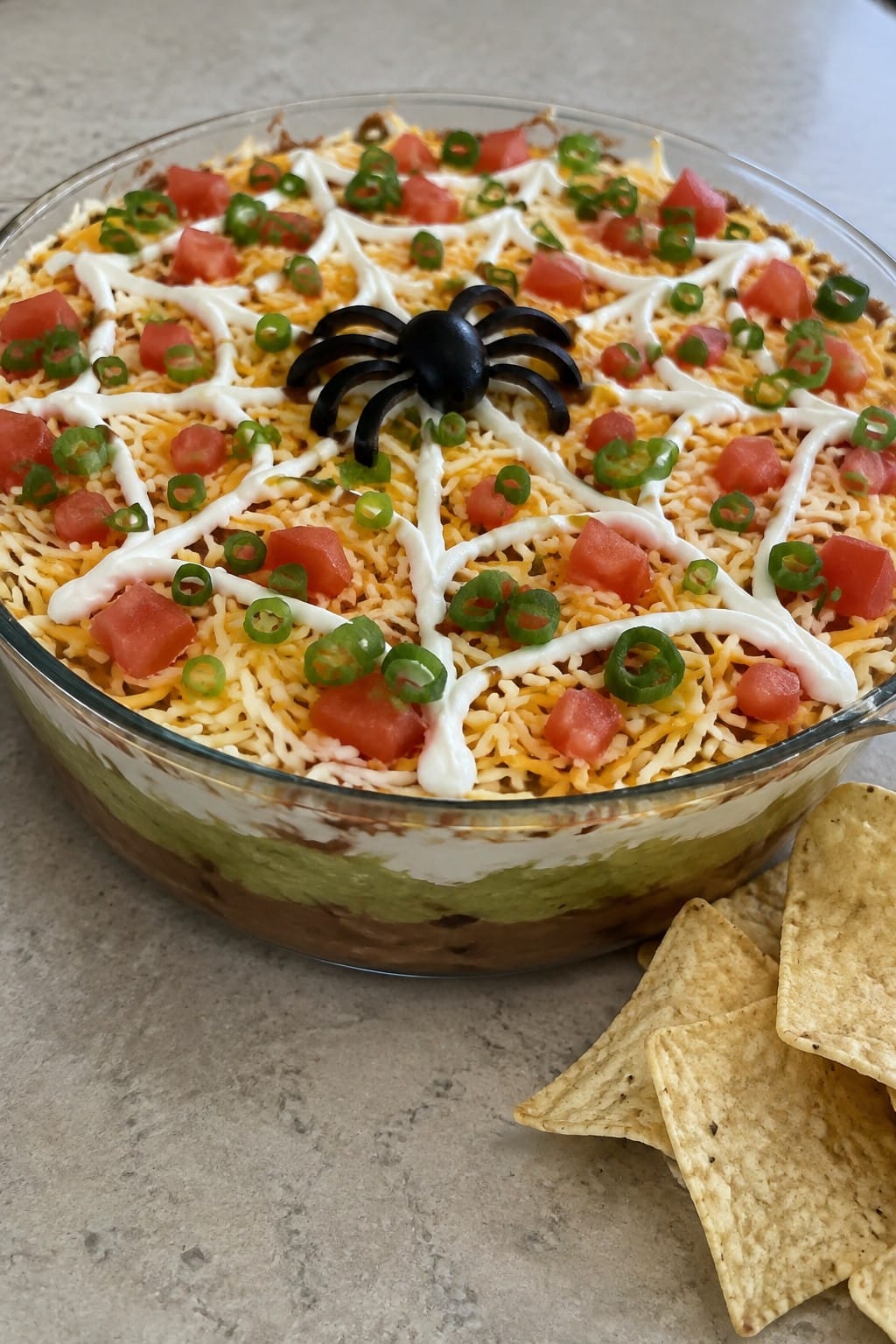 Spiderweb Seven-Layer Taco Dip with Tortilla Chips