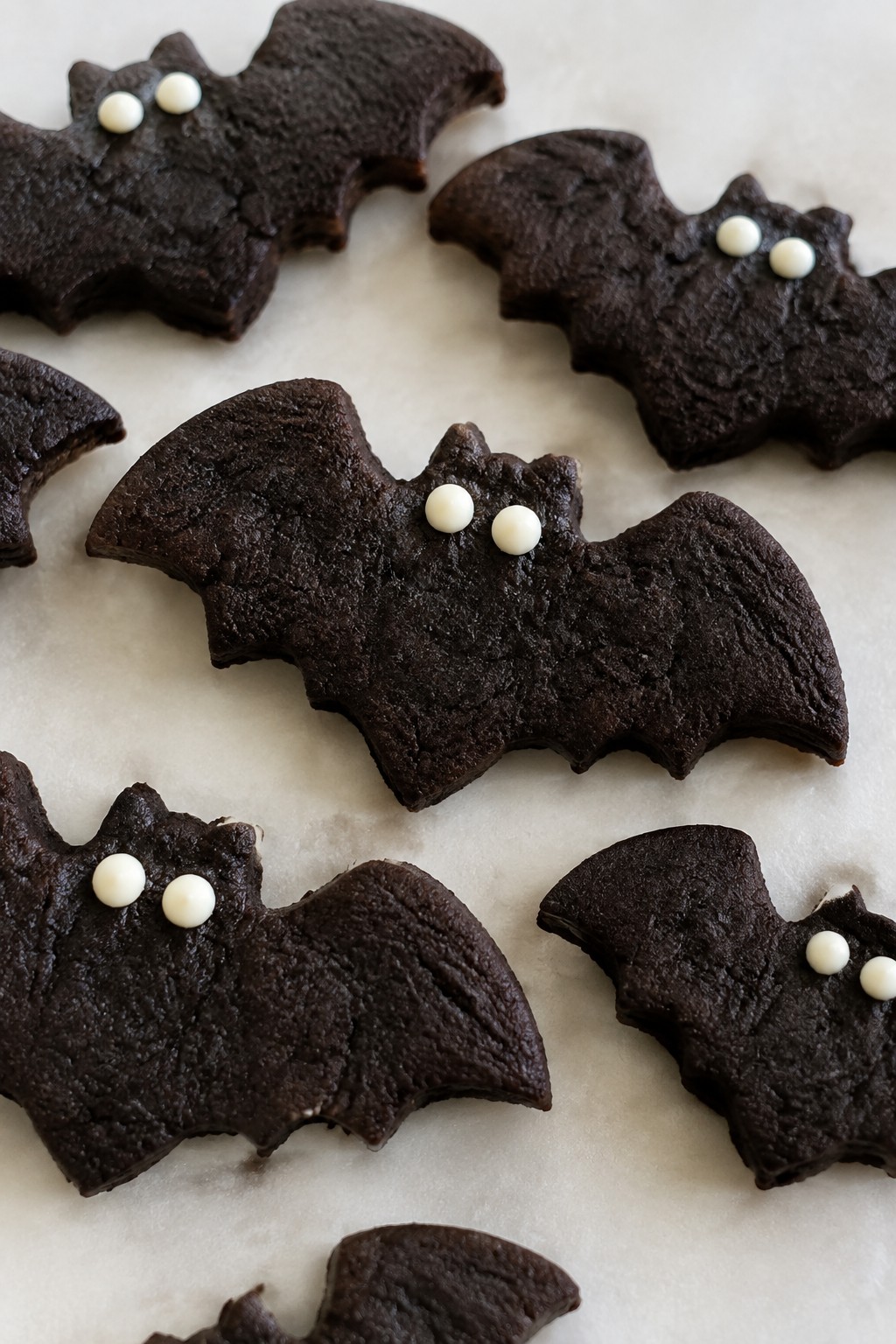 Black Cocoa Bat Cookies with White Chocolate Eyes