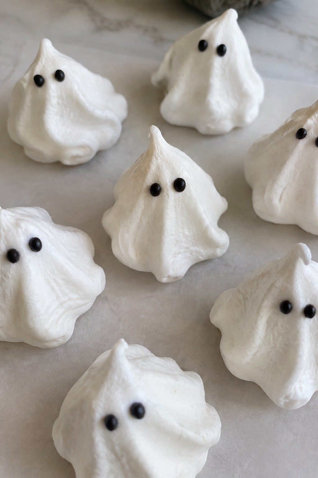 Ghostly Vanilla Meringue Cookies with Icing Eyes