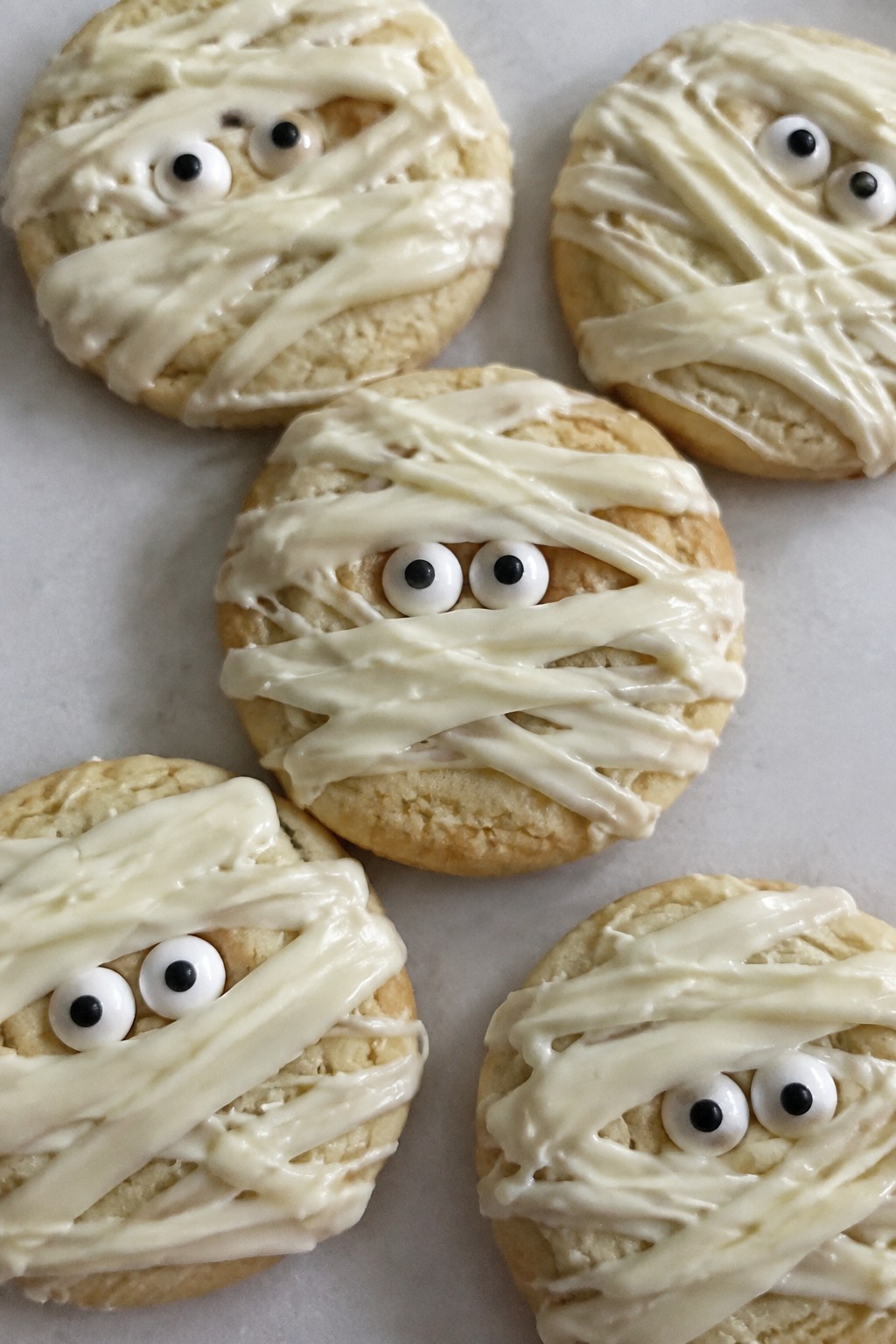 Mummy-Wrapped Sugar Cookies with Peeking Candy Eyes