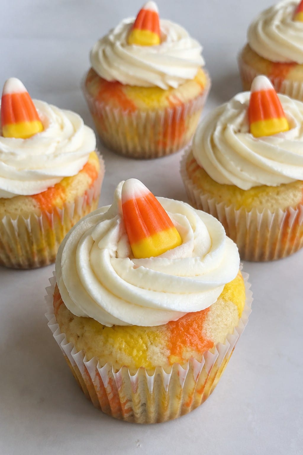 Candy Corn Swirl Vanilla Cupcakes