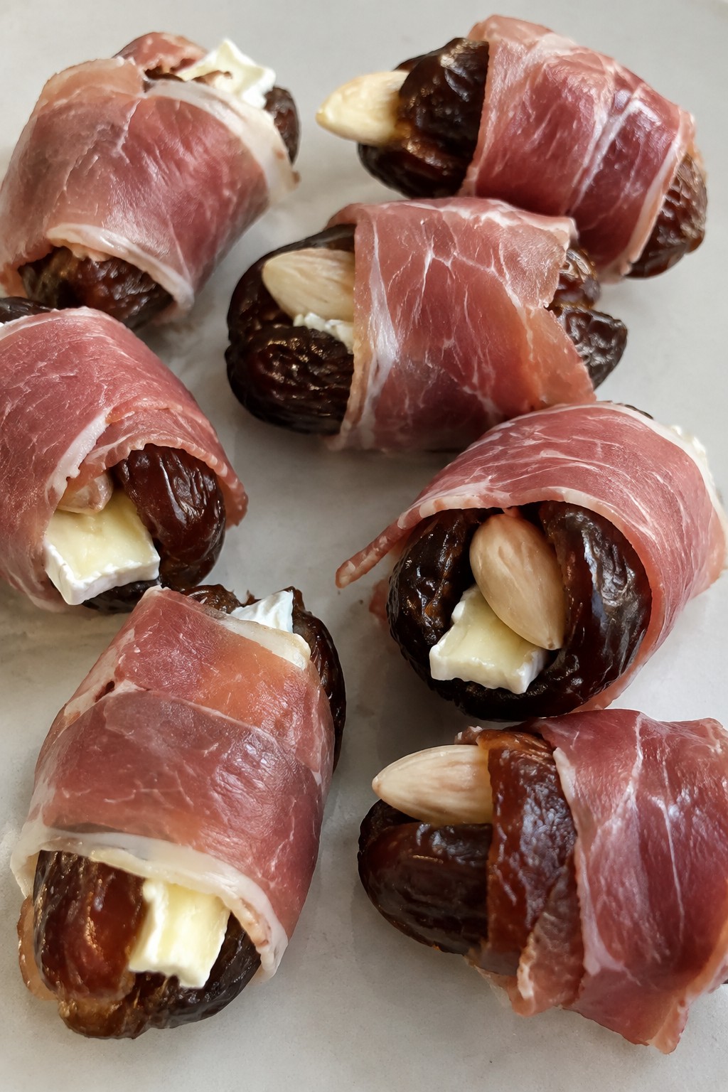 Brie-Stuffed Dates Wrapped in Prosciutto with Marcona Almonds
