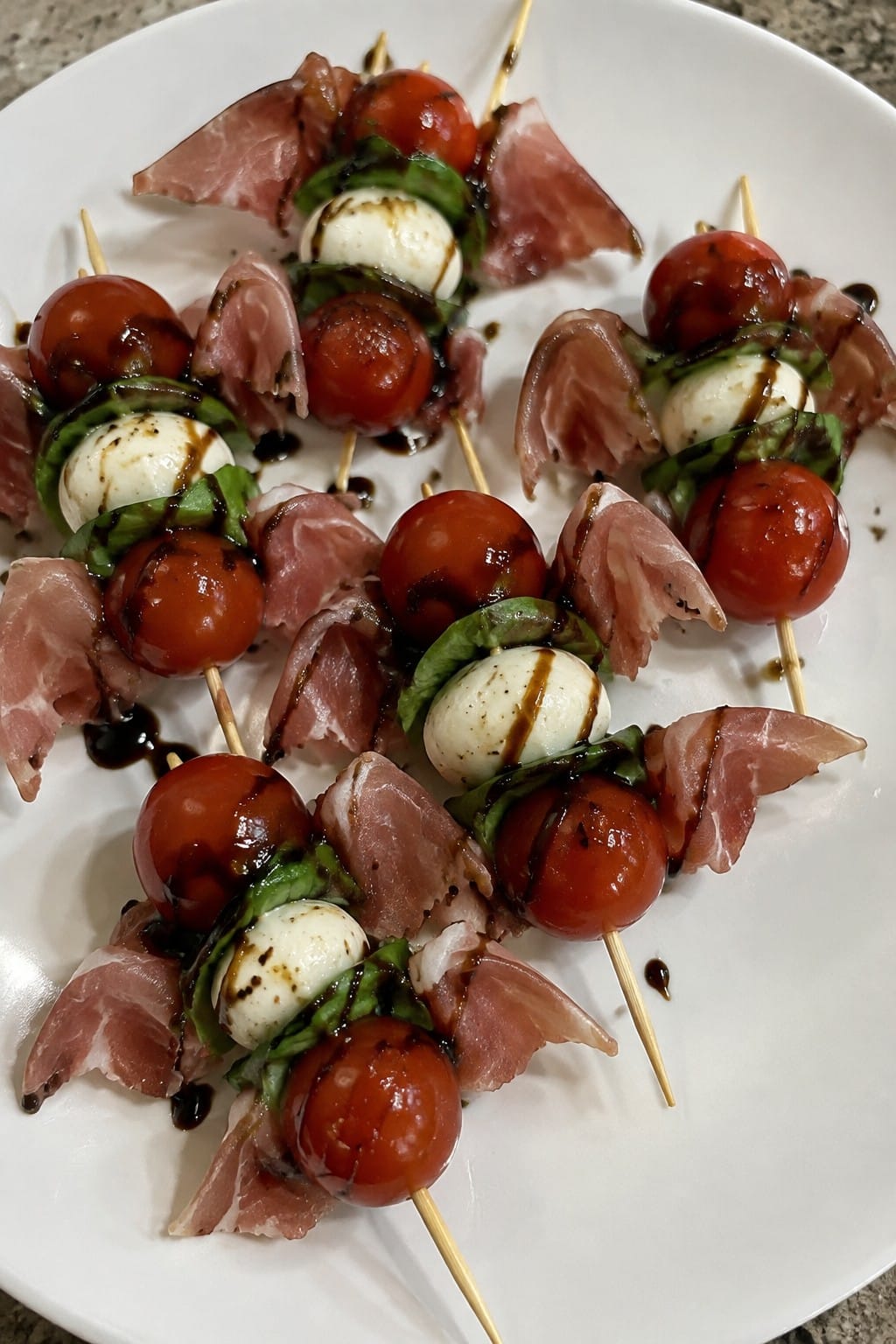 Bat-Wing Caprese Skewers Drizzled with Balsamic Glaze