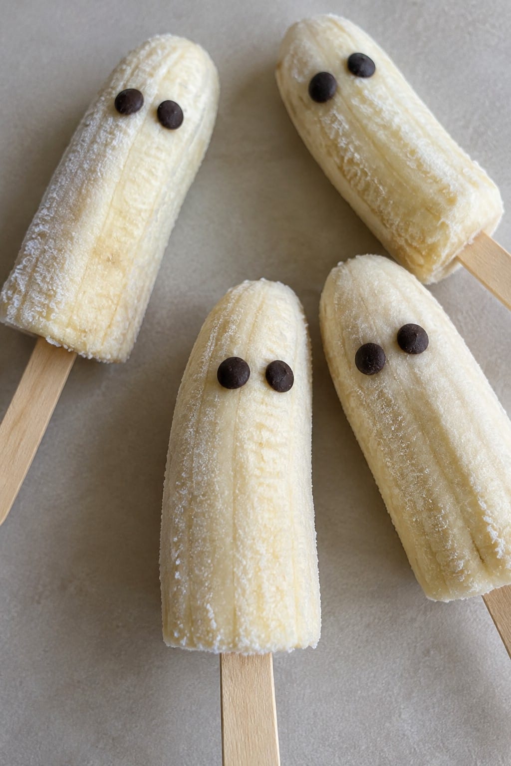Ghostly Banana Pops with Dark Chocolate Eyes