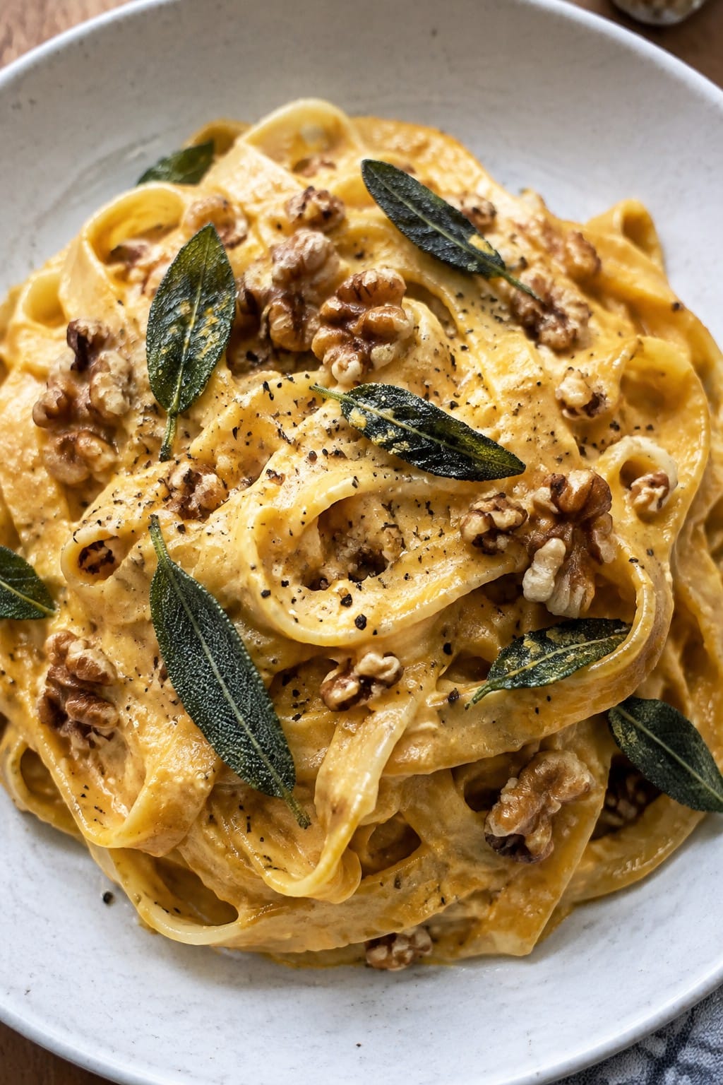 Pumpkin Alfredo Fettuccine with Crispy Sage and Toasted Walnuts