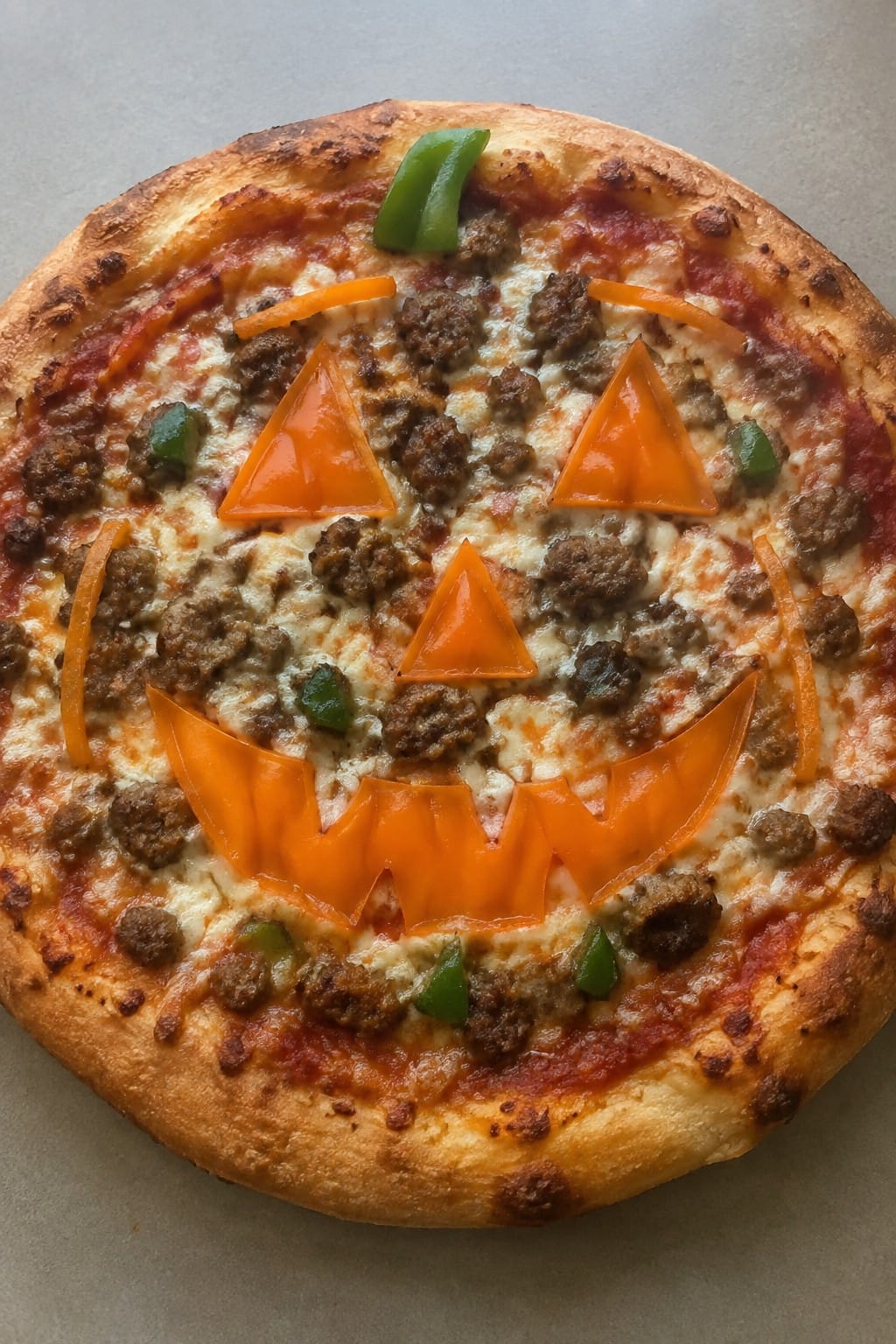 Jack-o'-Lantern Sausage and Pepper Pizza