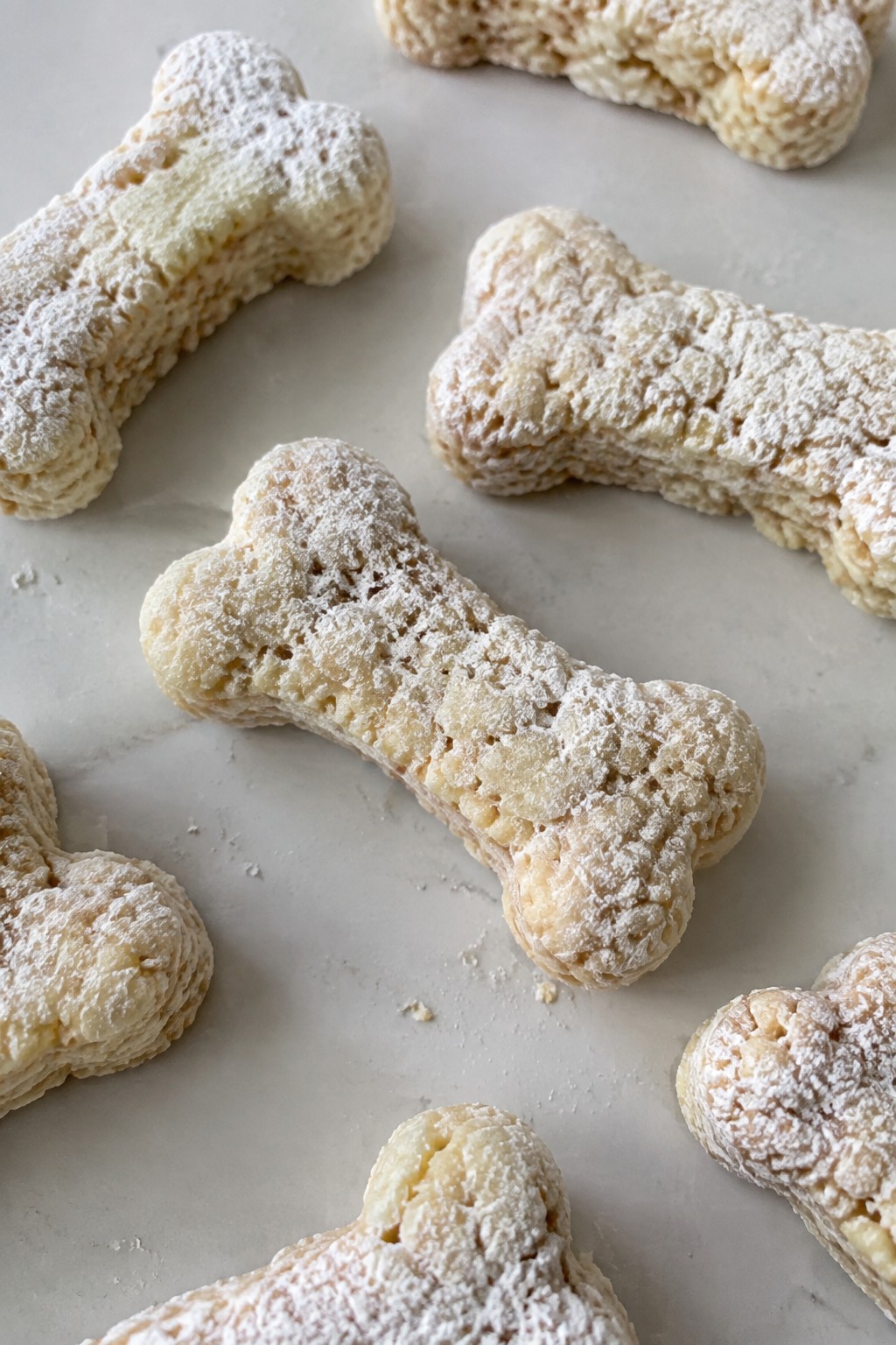 Skeleton Bone Rice Krispie Treats Dusted in Powdered Sugar