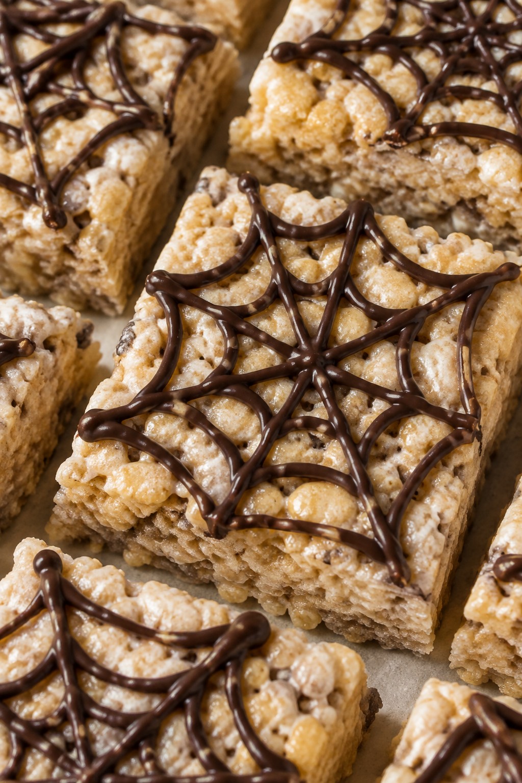 Spiderweb Rice Krispie Treat Bars with Dark Chocolate Drizzle