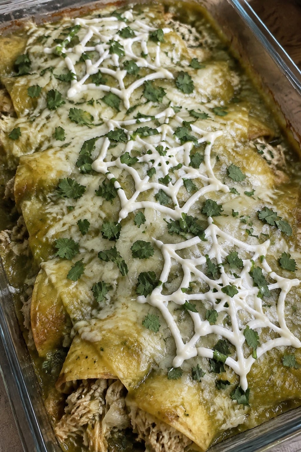 Spiderweb Chicken Enchiladas with Green Sauce