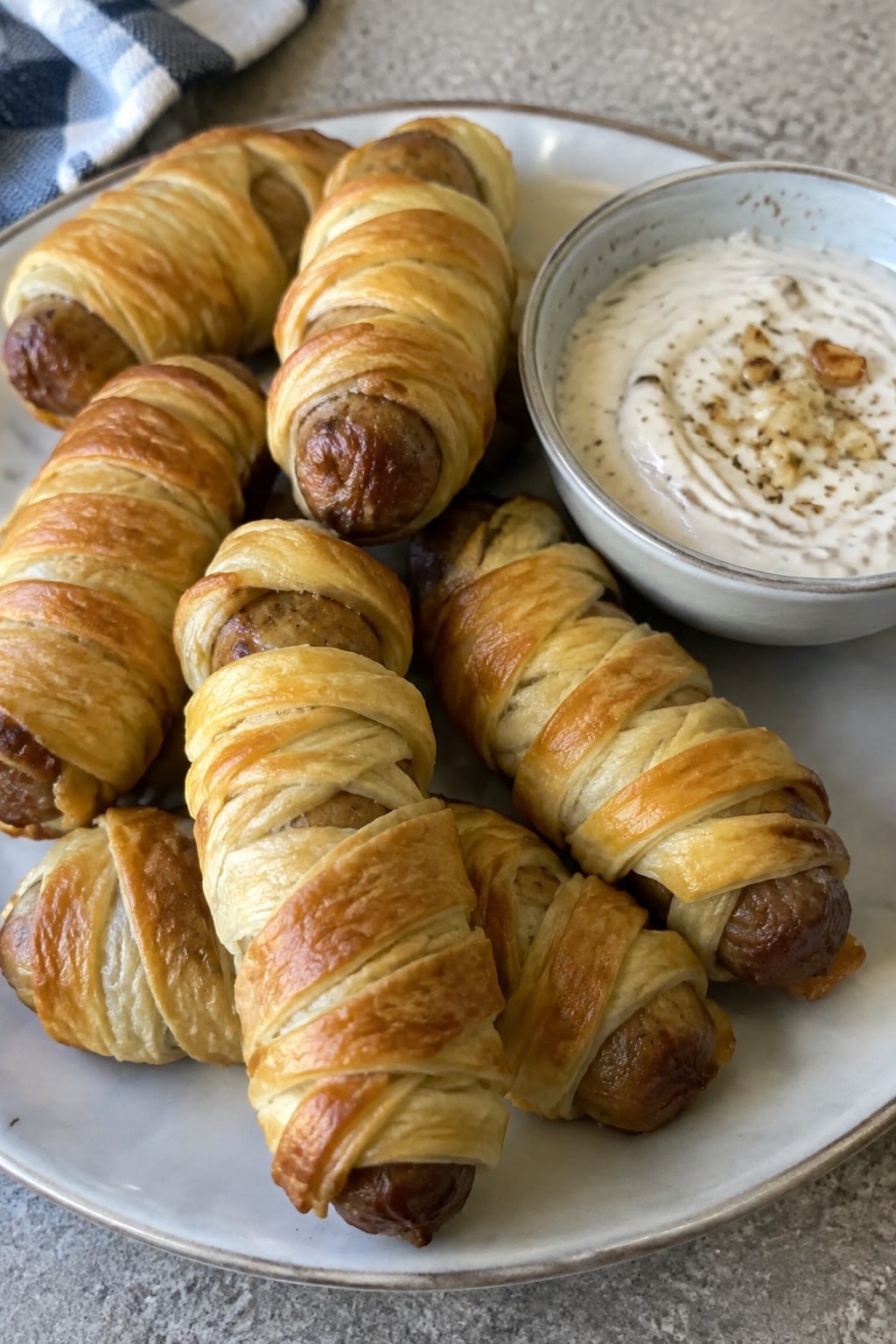 Mummy-Wrapped Italian Sausages with Roasted Garlic Aioli