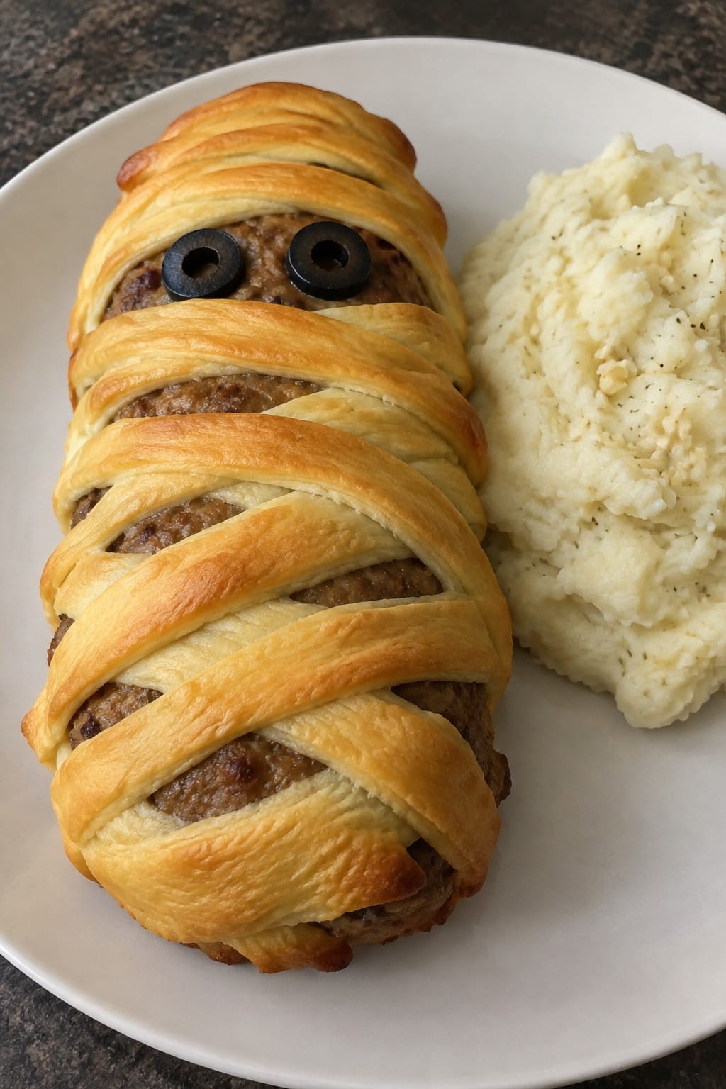 Mummy-Wrapped Meatloaf with Garlic Mashed Potatoes