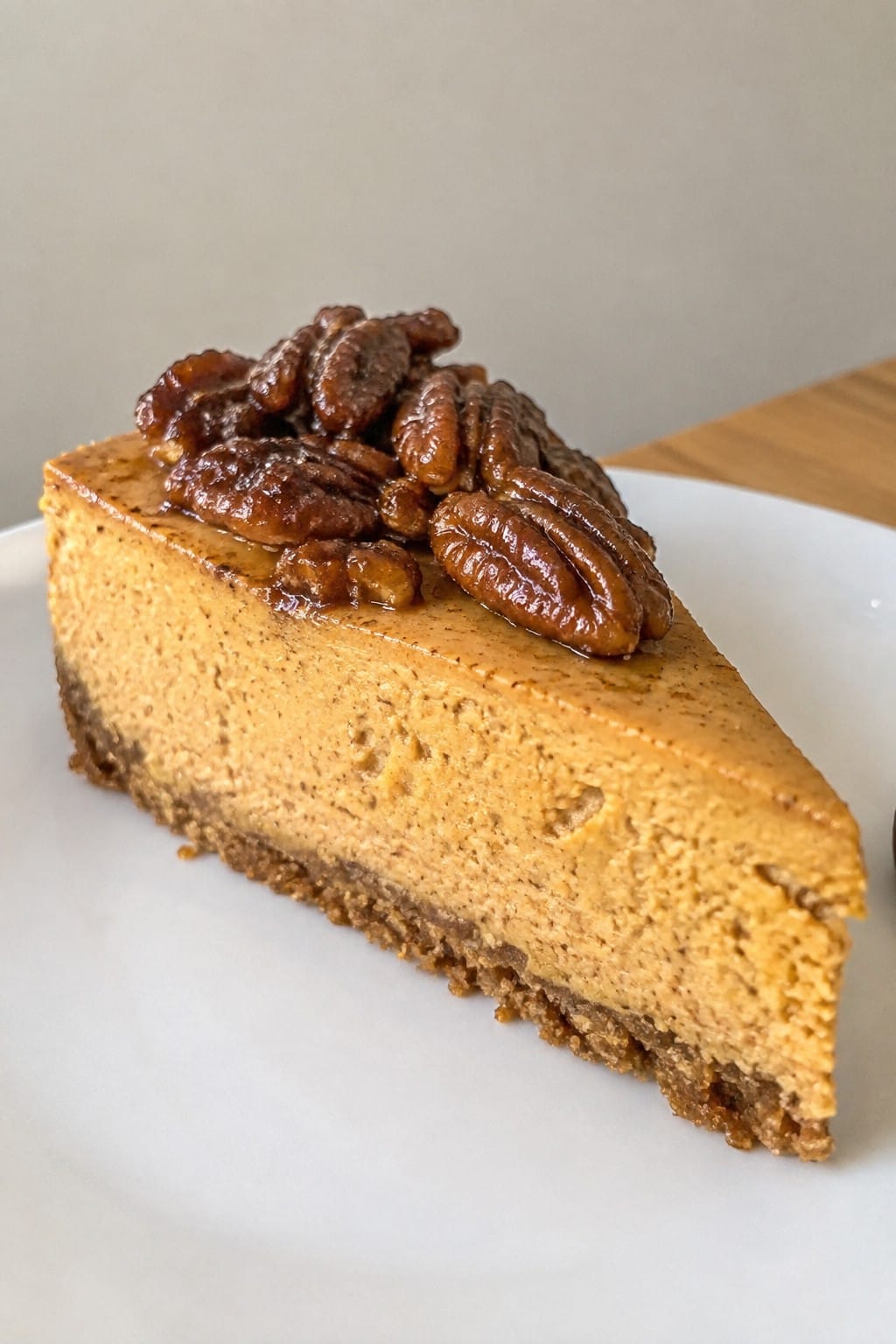 Spiced Pumpkin Cheesecake with Candied Pecan Topping