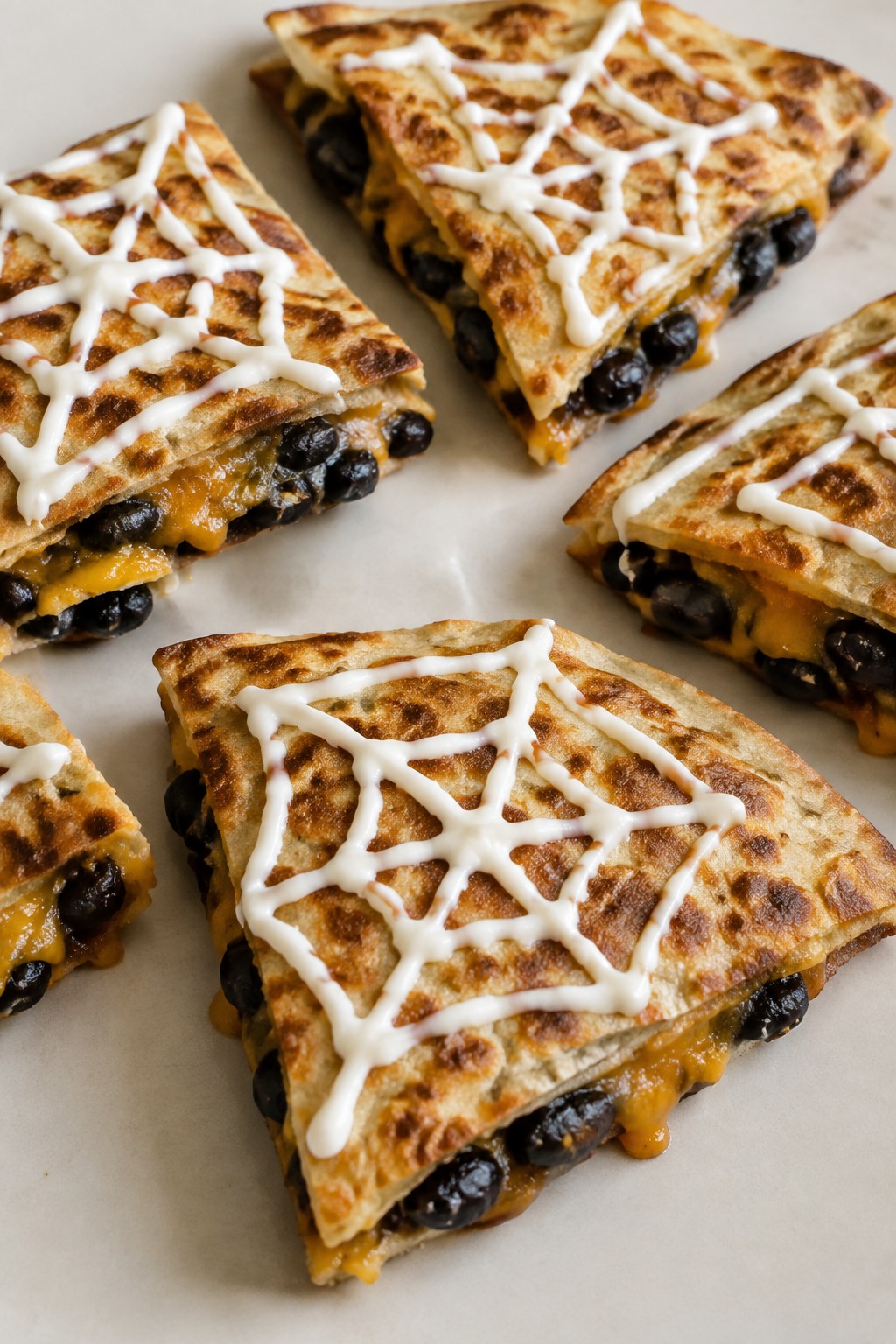Spiderweb Black Bean Quesadilla Bites
