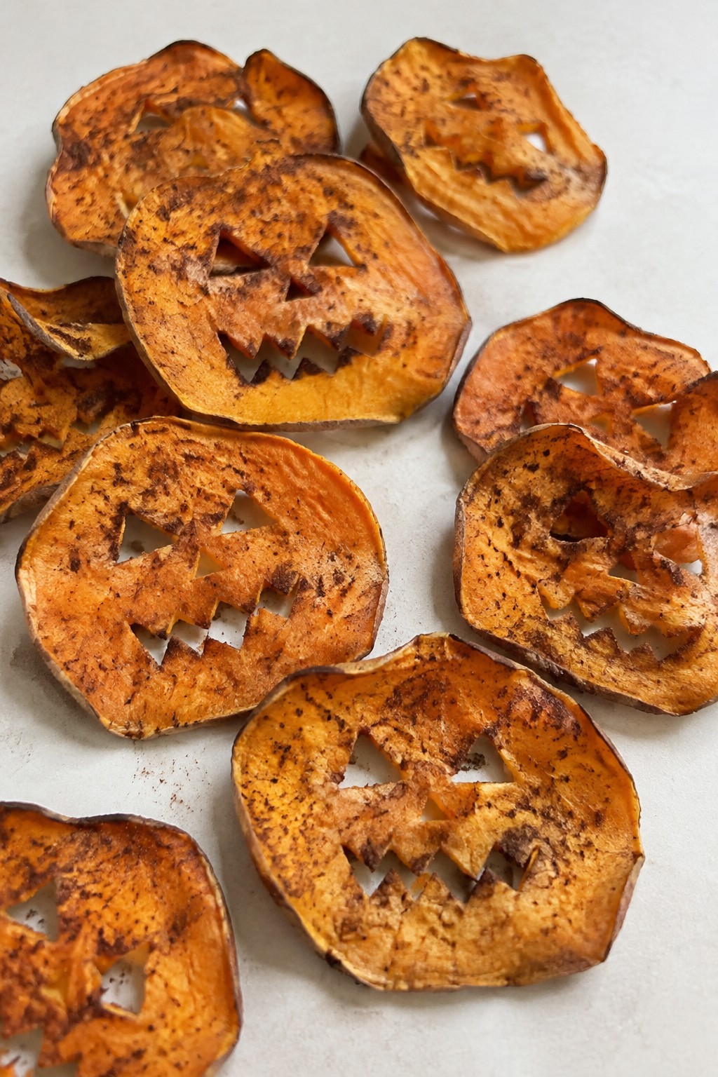 Baked Sweet Potato Jack-o'-Lantern Chips with Cinnamon