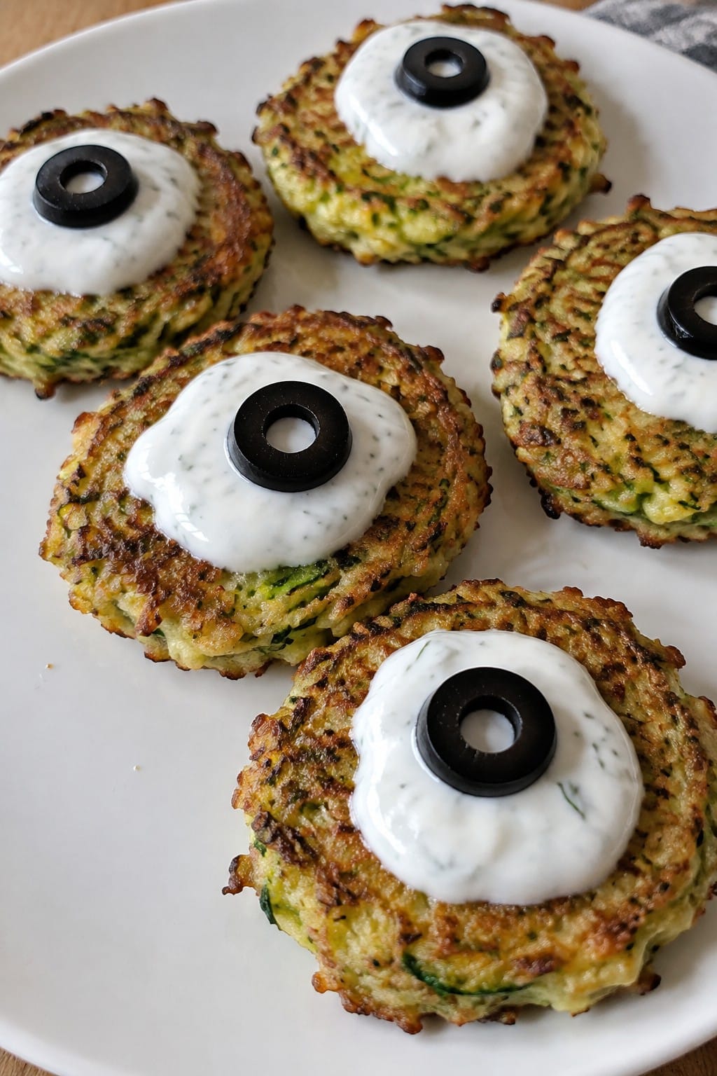 Zucchini Fritter Eyeballs with Garlic Yogurt Sauce