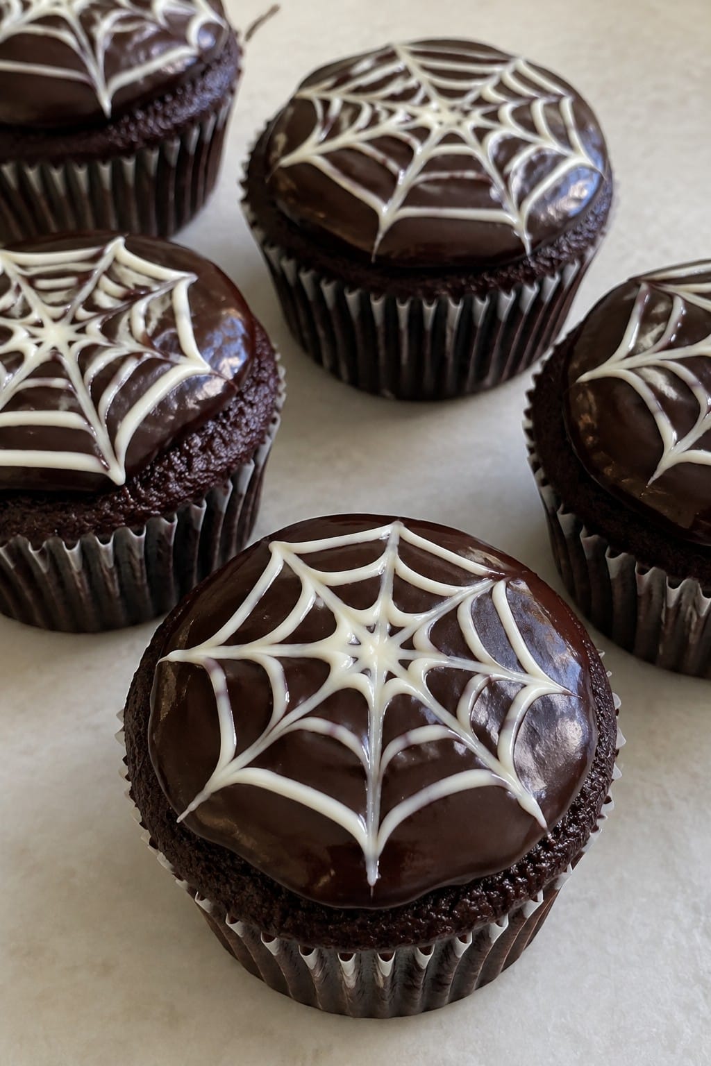 Spooky Spiderweb Chocolate Ganache Cupcakes