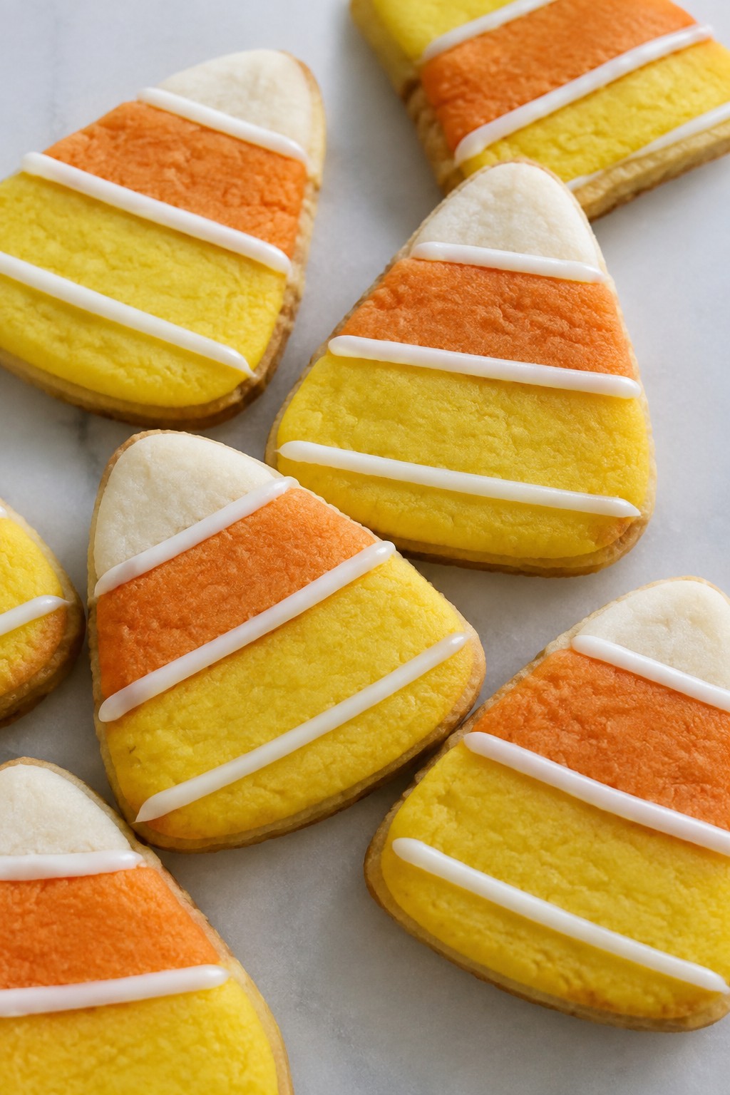 Candy Corn Layered Sugar Cookies with Striped Icing