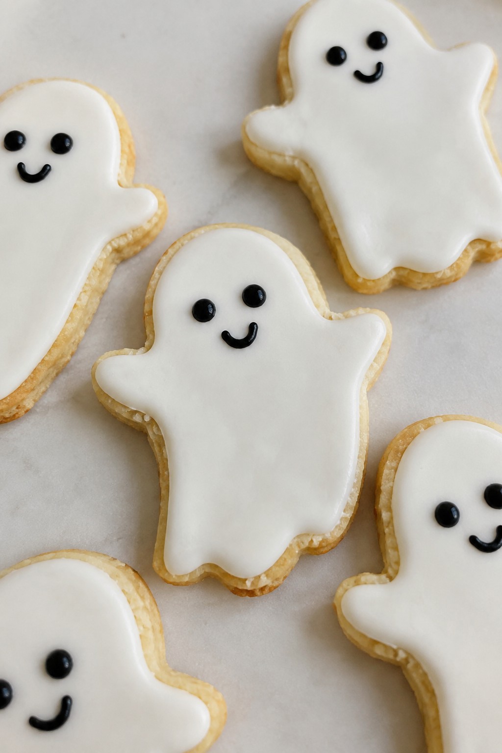 Spooky Ghost Sugar Cookies with Royal Icing Faces