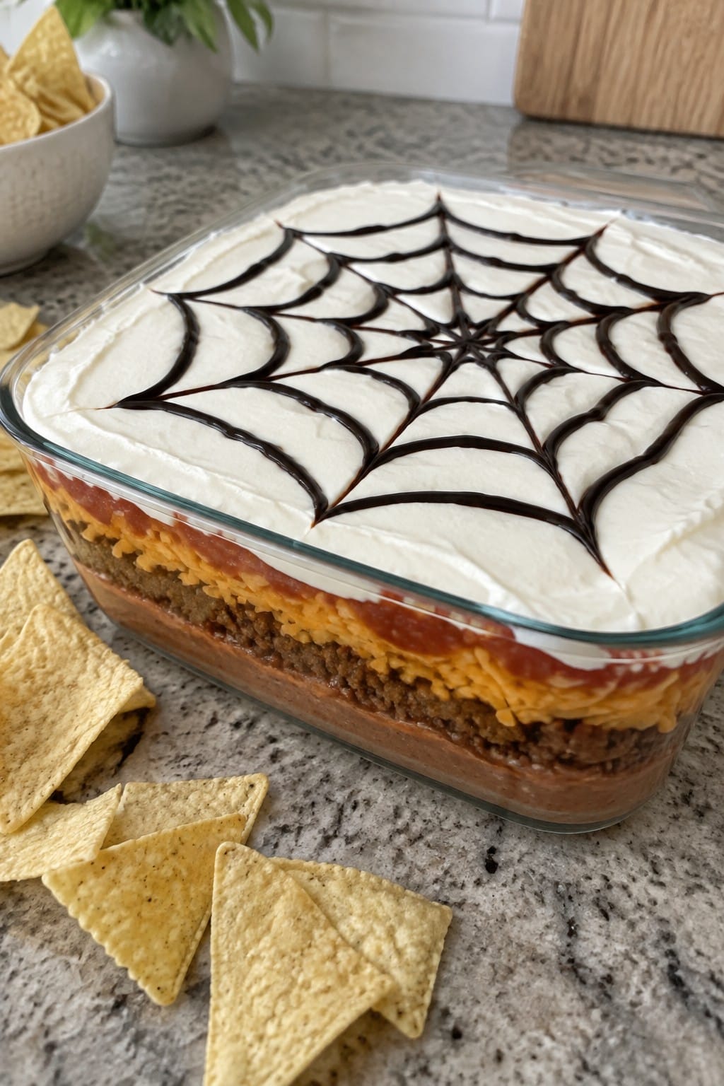Spiderweb Layered Taco Dip with Tortilla Chips