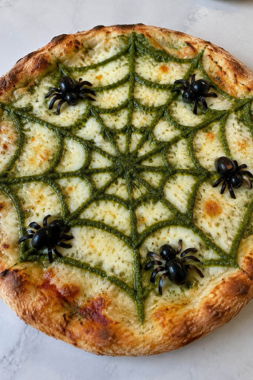 Spooky Spiderweb Pesto Pizza