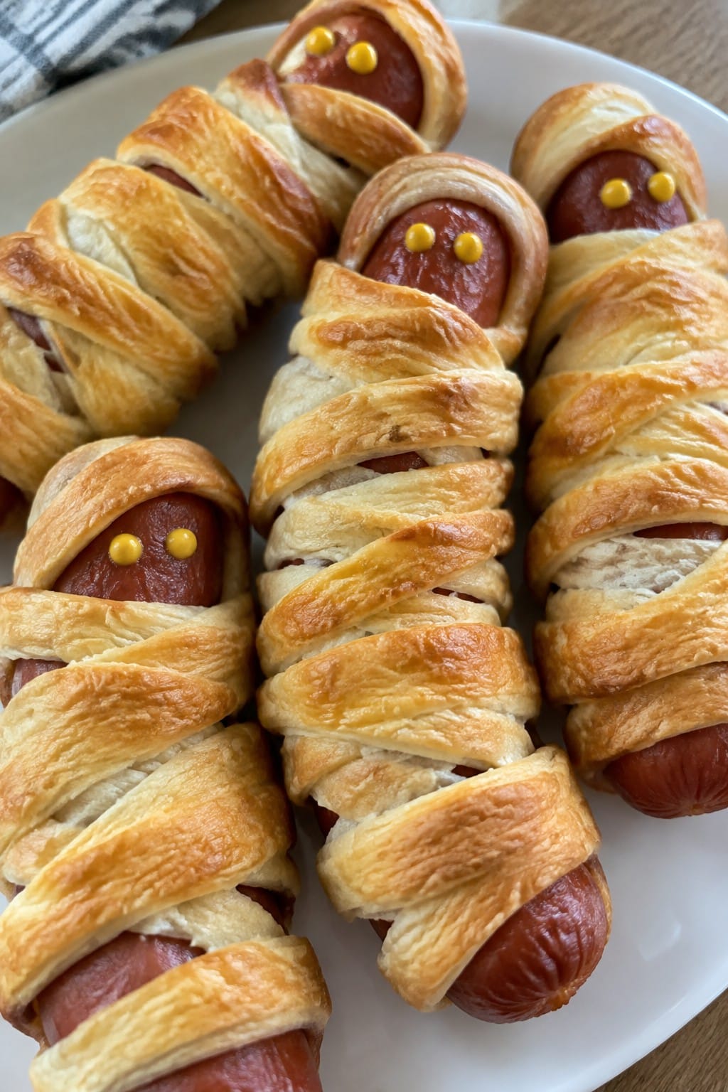 Mummy Crescent-Wrapped Hot Dogs with Mustard