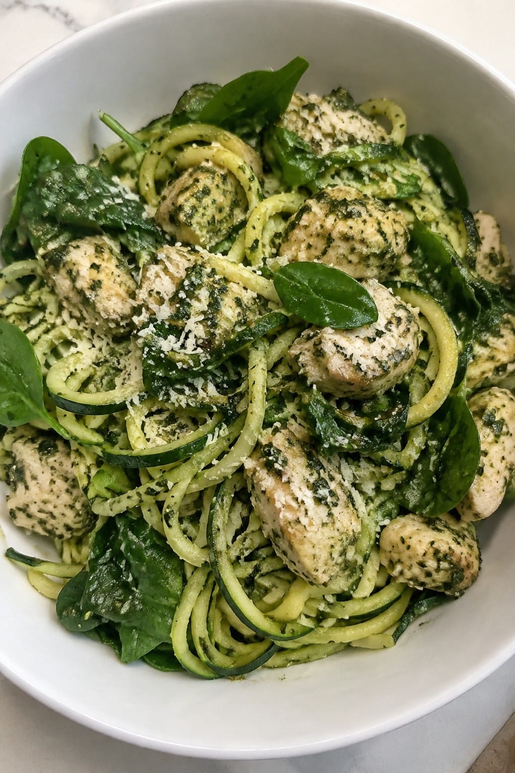 Zucchini Noodle Bowls with Pesto Chicken and Spinach