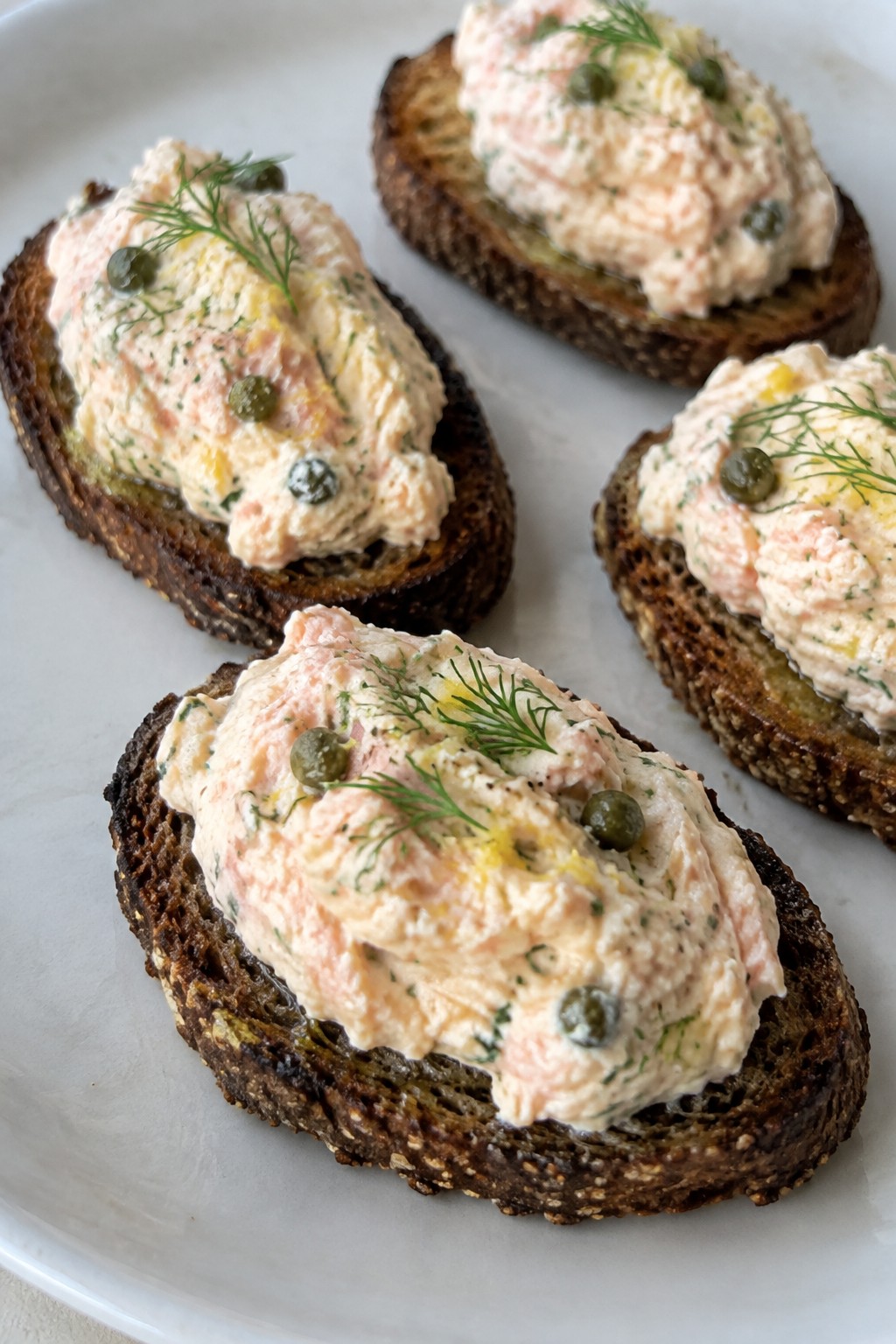Ghostly Smoked Salmon Mousse on Rye Crostini