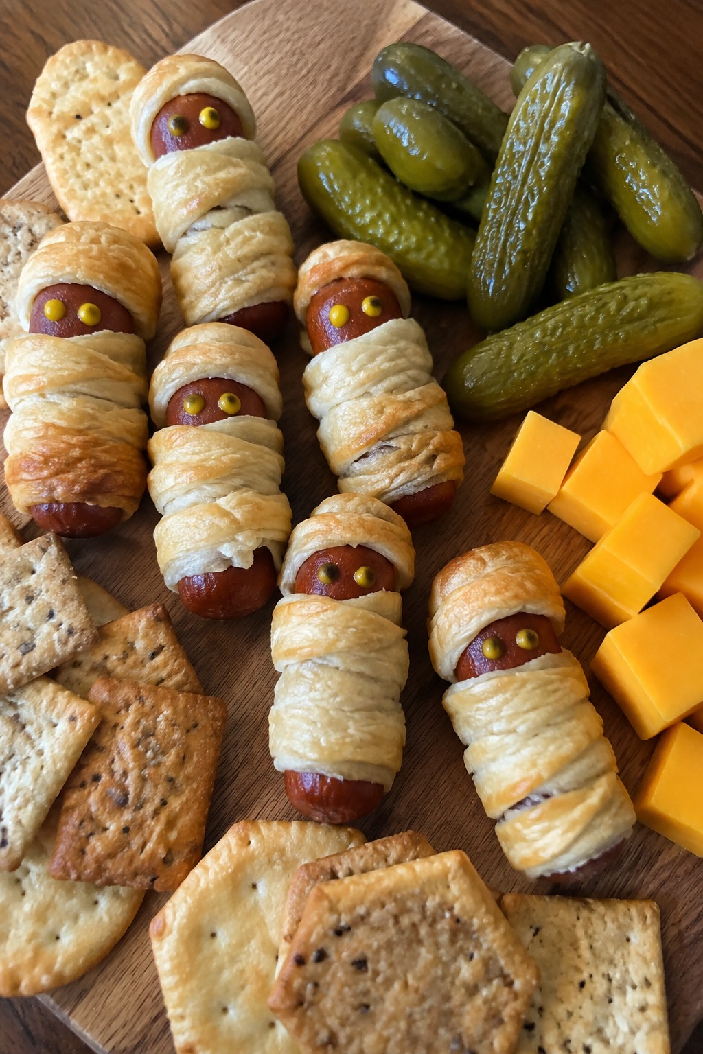 Mummy-Wrapped Sausage and Pickle Board