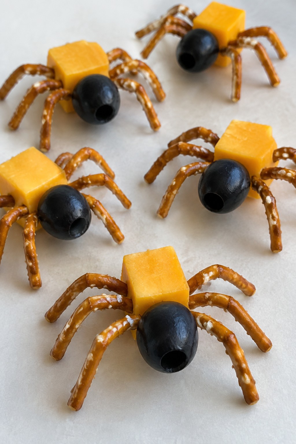 Spooky Olive and Cheese Spider Bites