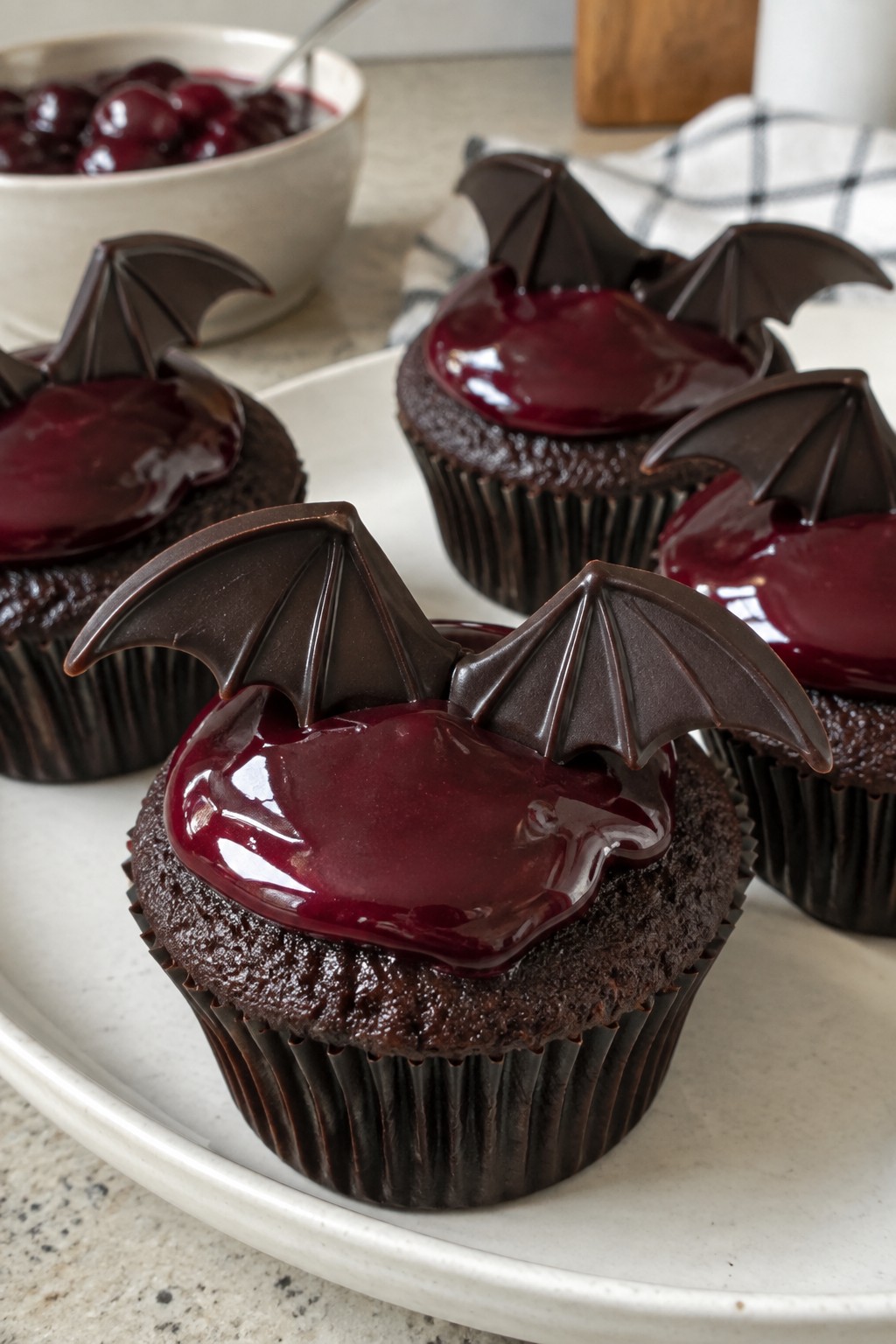 Bat Wing Dark Chocolate Cupcakes with Cherry Ganache