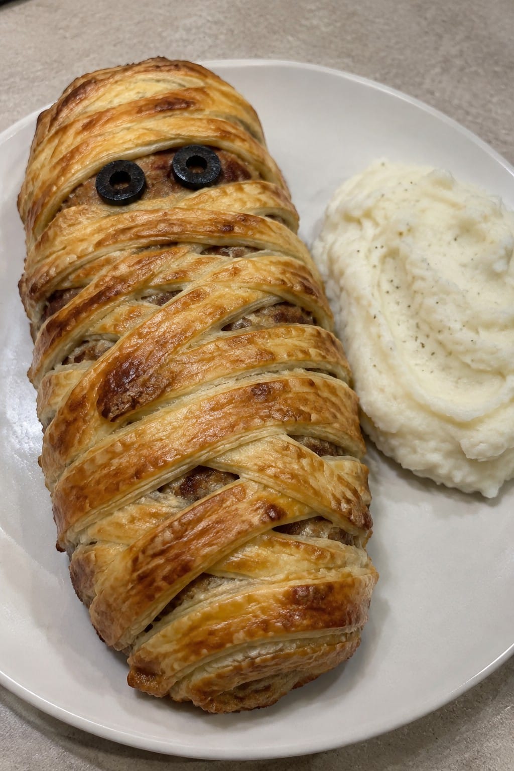 Mummy-Wrapped Meatloaf with Garlic Mashed Potatoes