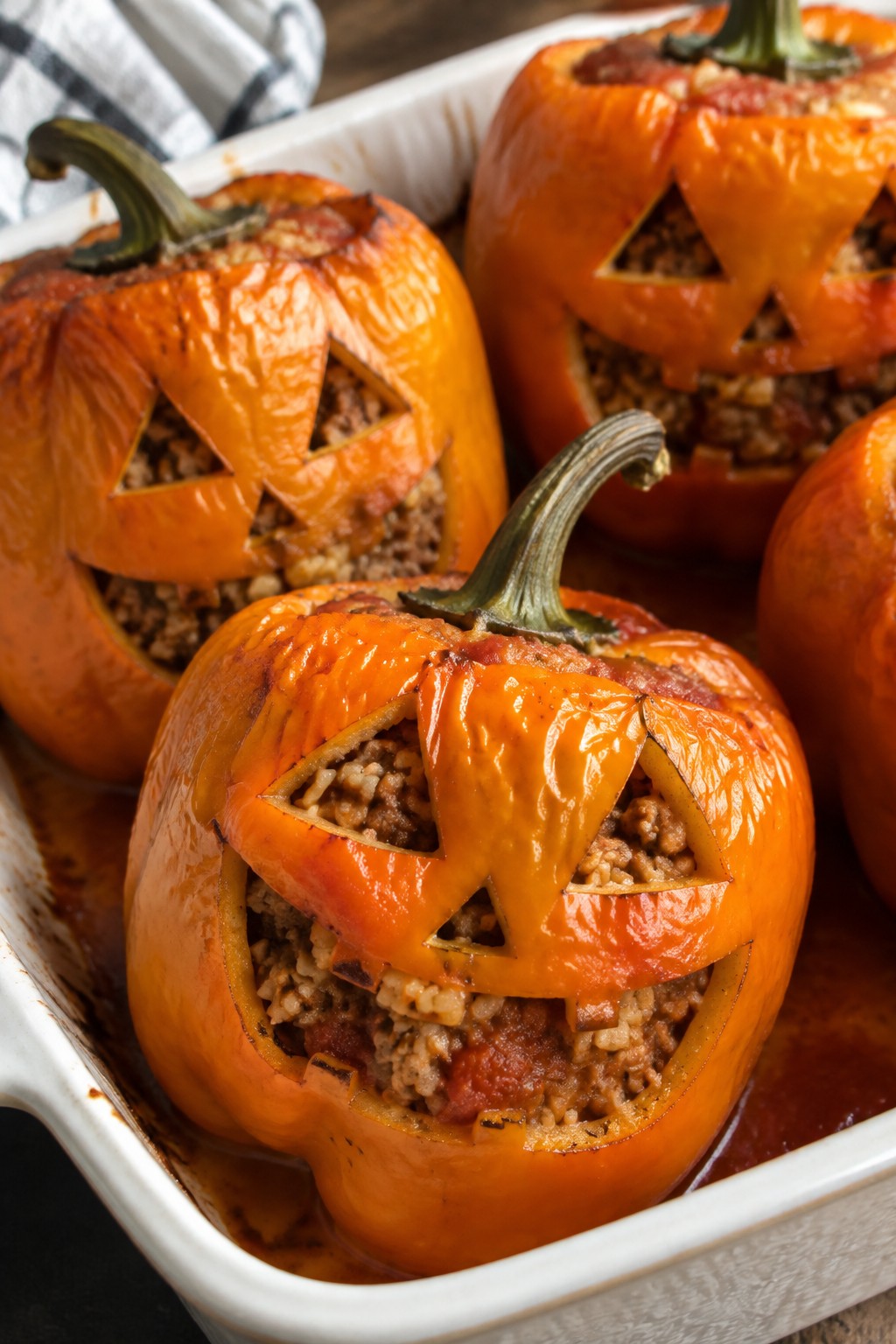 Jack-o'-Lantern Stuffed Bell Peppers with Brown Rice and Turkey