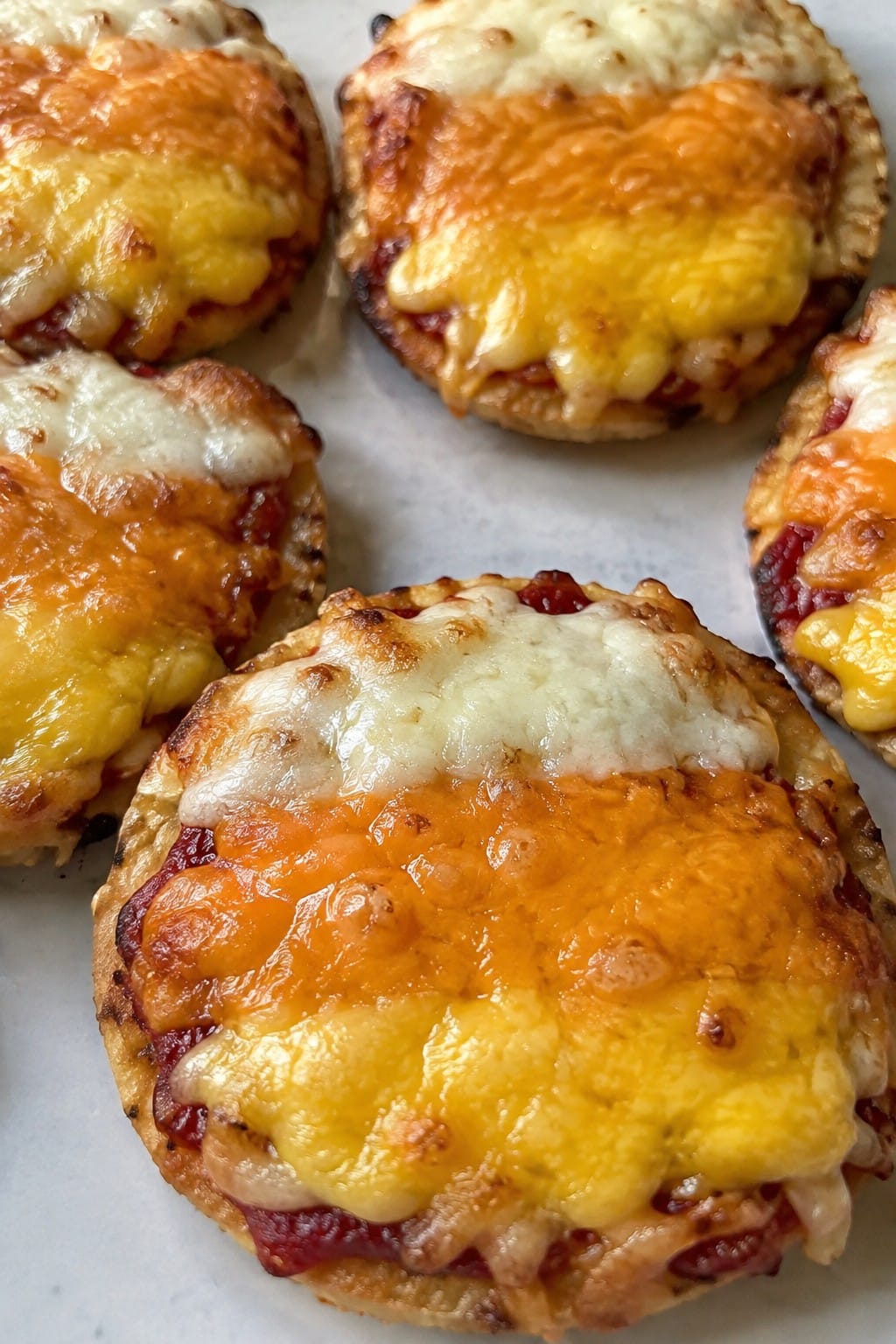 Candy Corn Layered Cheese Pizzas