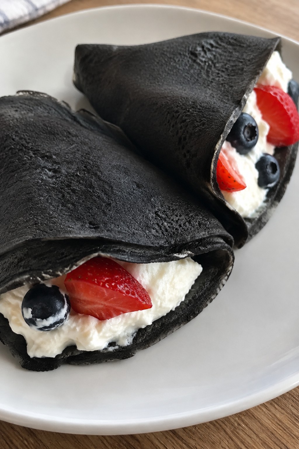 Black Cocoa Crepes Filled with Cream Cheese and Berries
