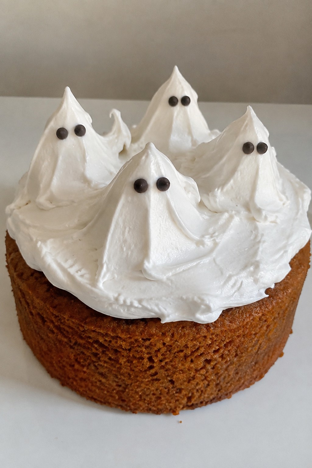 Pumpkin Spice Ghost Cake with Marshmallow Frosting